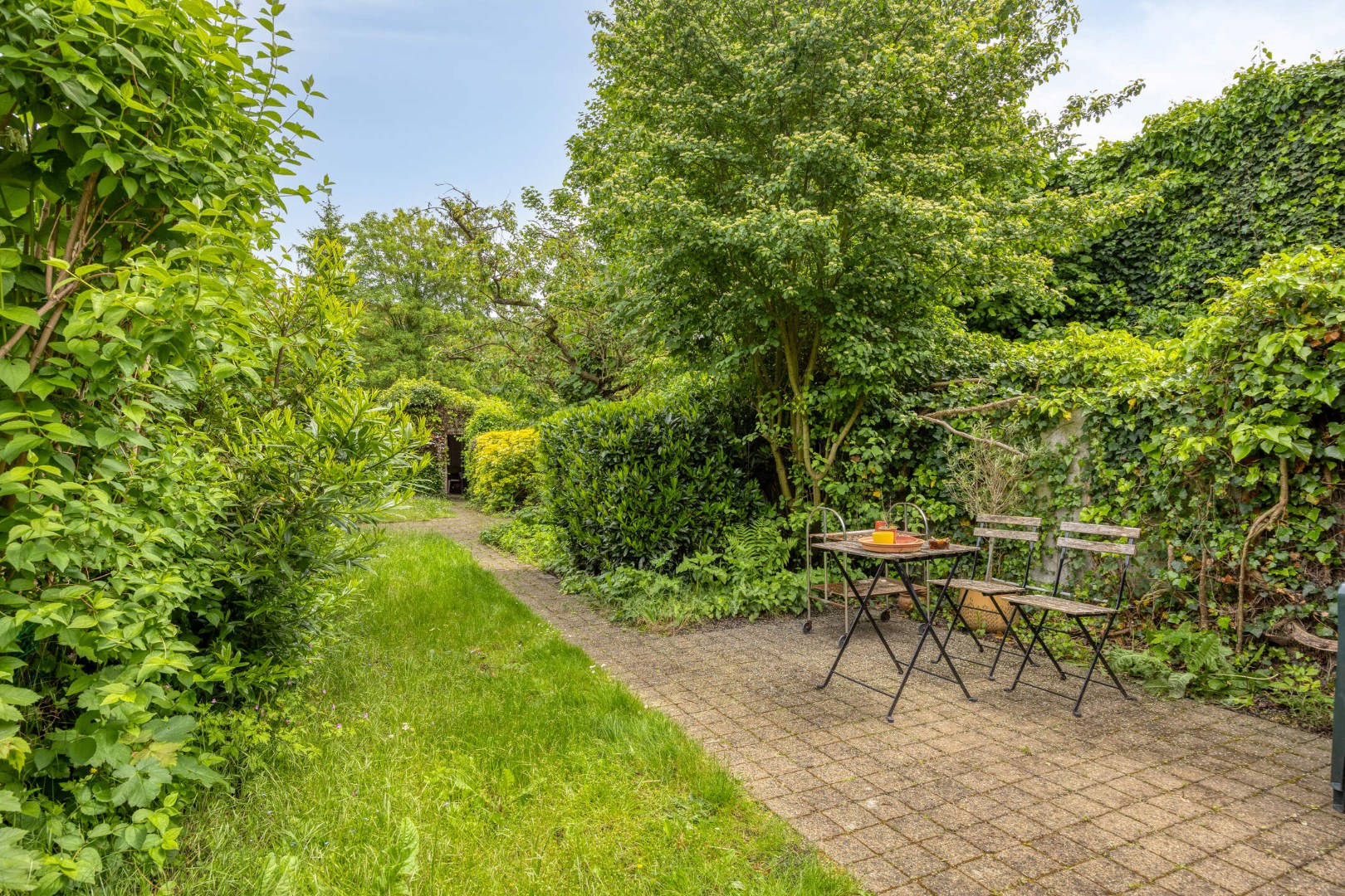 Ruime stadswoning / opbrengstpand  met achteruitgang via Janseniusstraat met 4 slaapkamers, garage en tuin te Leuven- EPC 239kwh/m2 