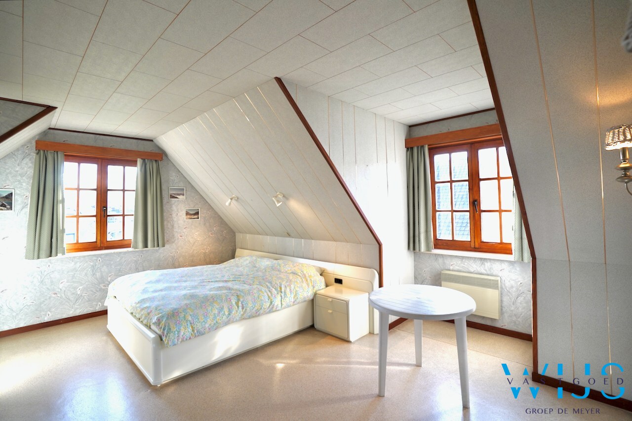 Fantastische open bebouwing met dubbele garage in gegeerde woonwijk te Evergem 