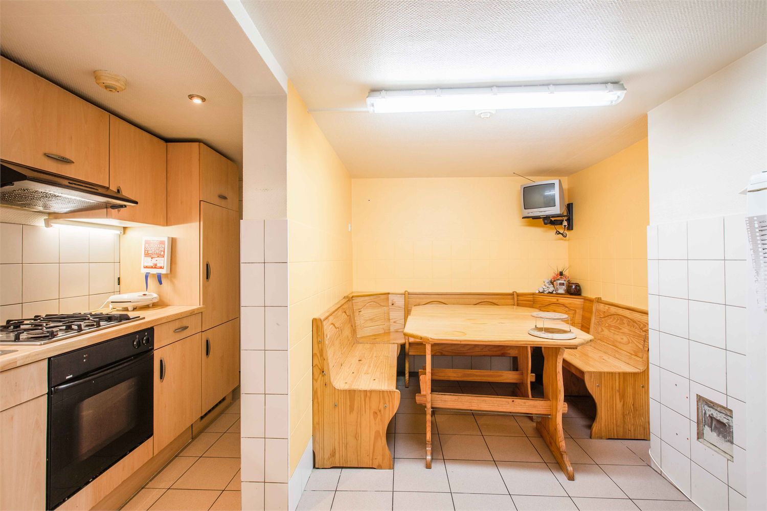 Ideaal gelegen studentenhuis bestaande uit 9 kamers en 2 studio's! 