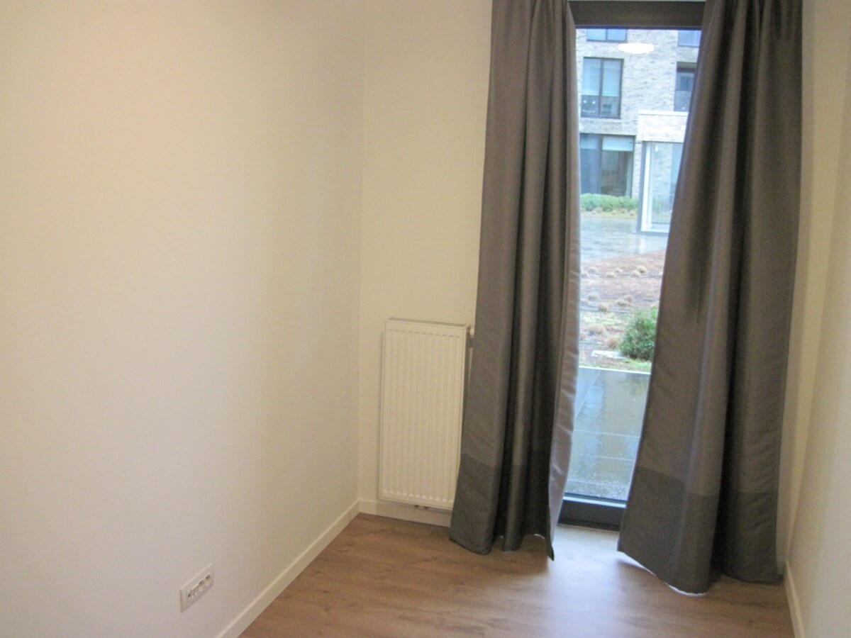 Gelijkvloers 2-slaapkamer appartement met uitzonderlijk terras. 