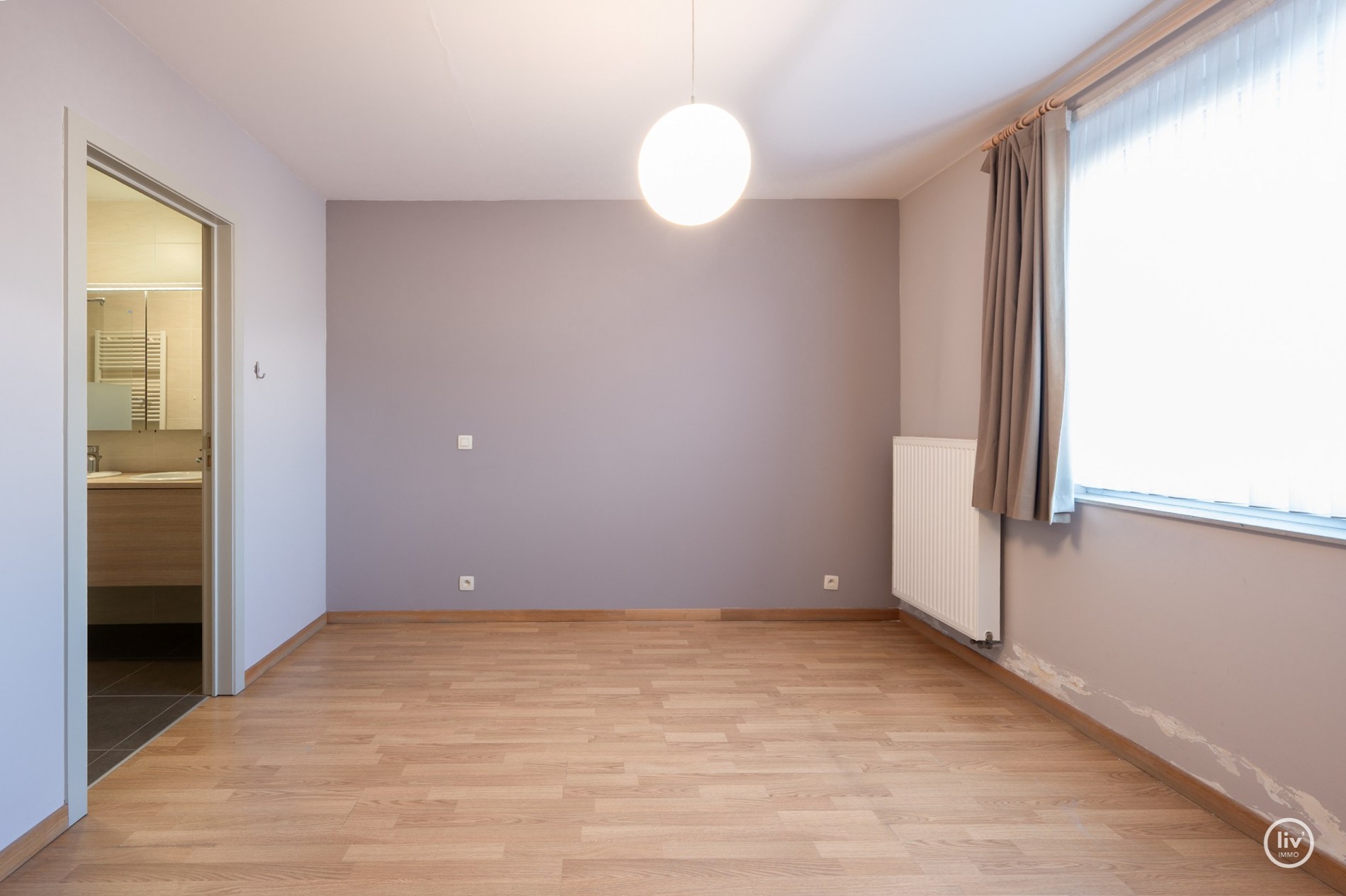 Centraal gelegen 2 slaapkamer appartement met ruime terrassen in een recent gebouwde residentie (met mog. tot aankoop van inpandige garage) 