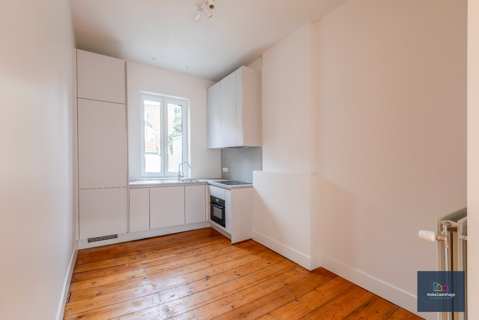 Ruim duplexappartement te huur in het hart van Gent 