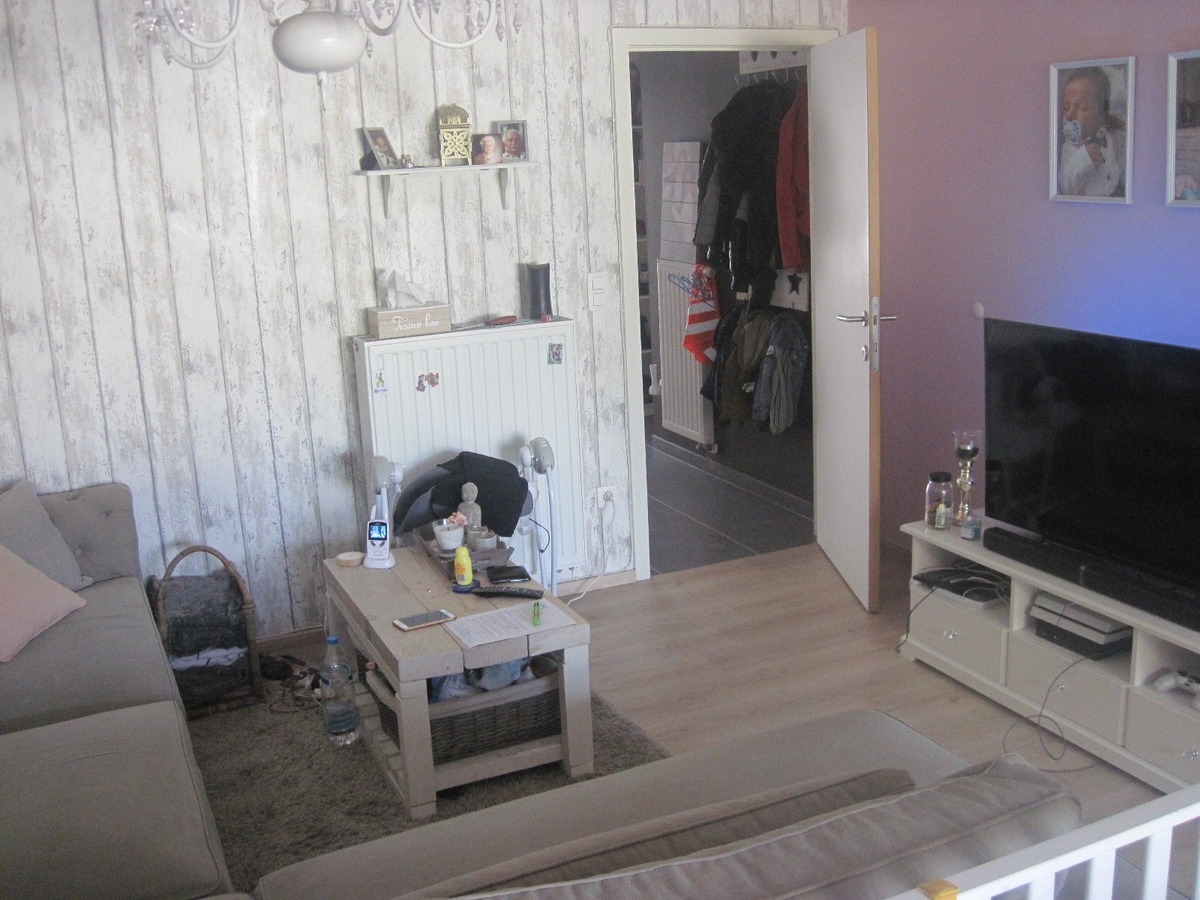 Ruim gelijkvloers appartement met terras en tuintje. Incl. afz. garage ! 