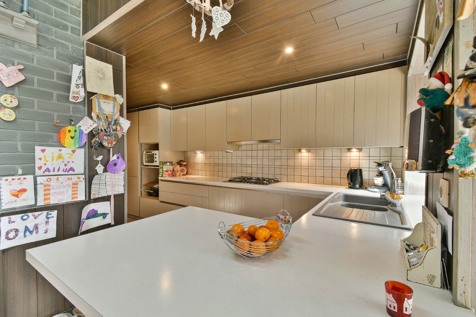 Woning met drie slaapkamers, garage en zonnige tuin 