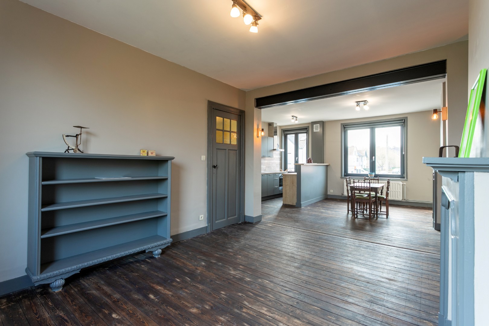 Handelshuis met woongedeelte, garage en tuin 