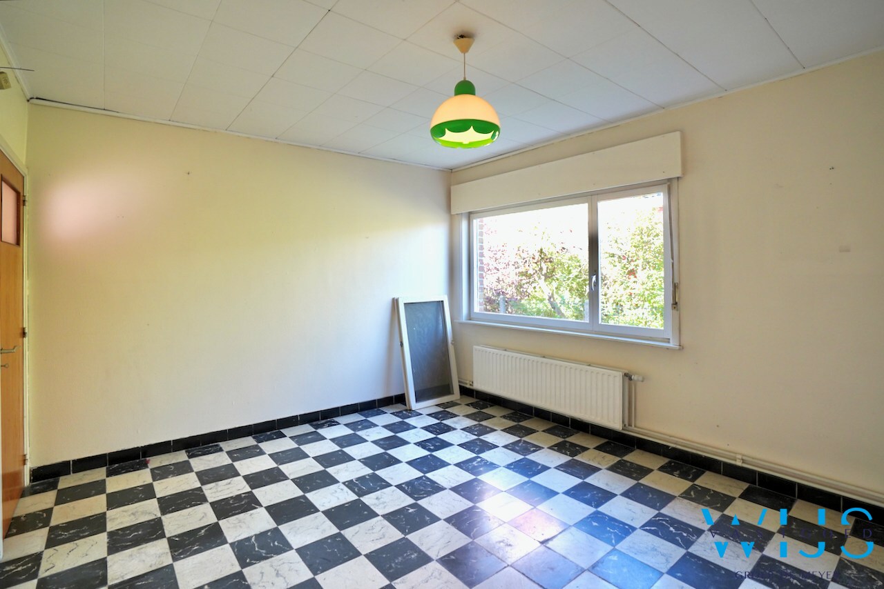 Open bebouwing op ruim perceel van 892m² te Ertvelde ! 