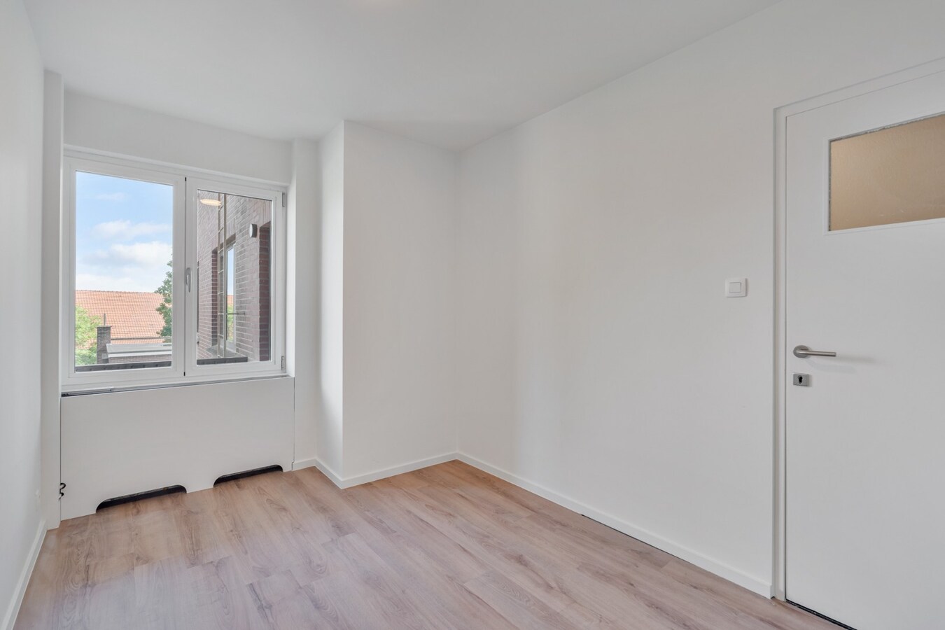 Stijlvol gerenoveerd appartement met moderne uitstraling in het centrum van Maaseik! 