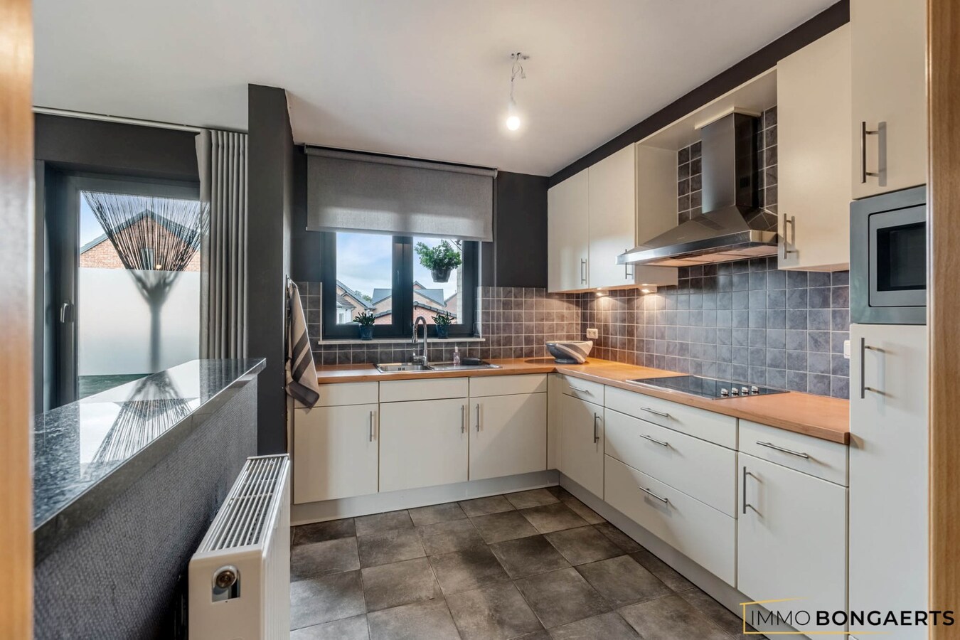 Ruim duplexappartement met 4 slaapkamers 