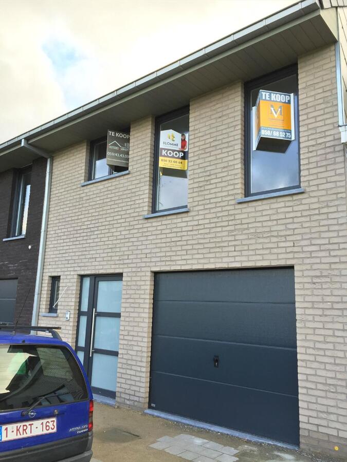 RUIME RIJWONING MET GARAGE EN PERFECT ZUIDGERICHTE TUIN 