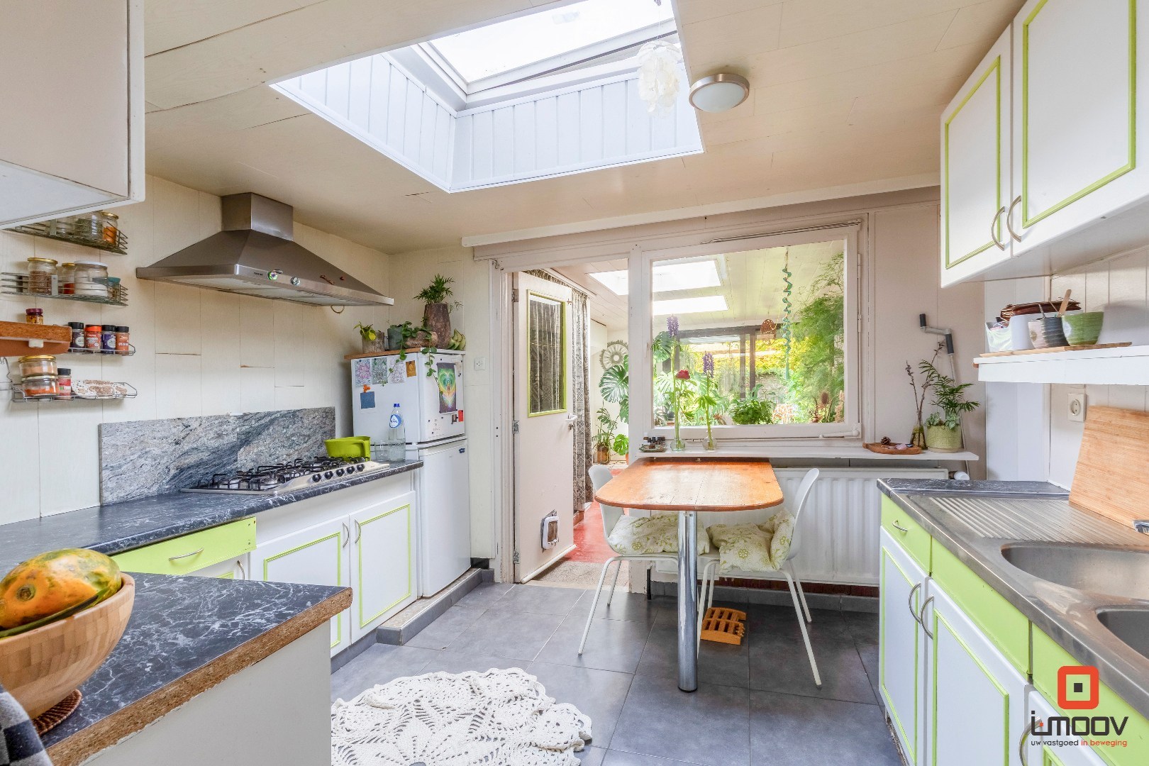 Karaktervolle tuinwijkwoning met unieke architectuur en garage te Gentbrugge 