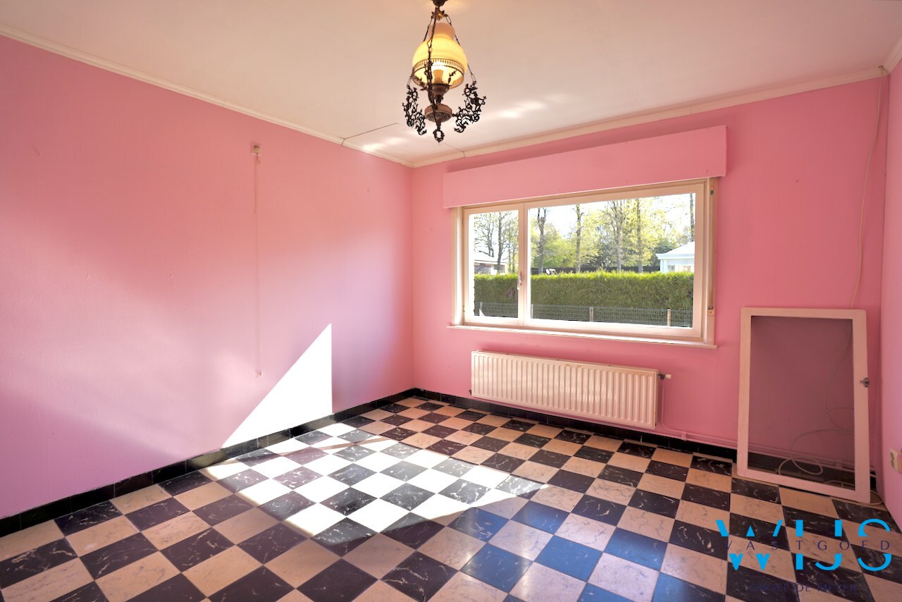 Open bebouwing op ruim perceel van 892m² te Ertvelde ! 