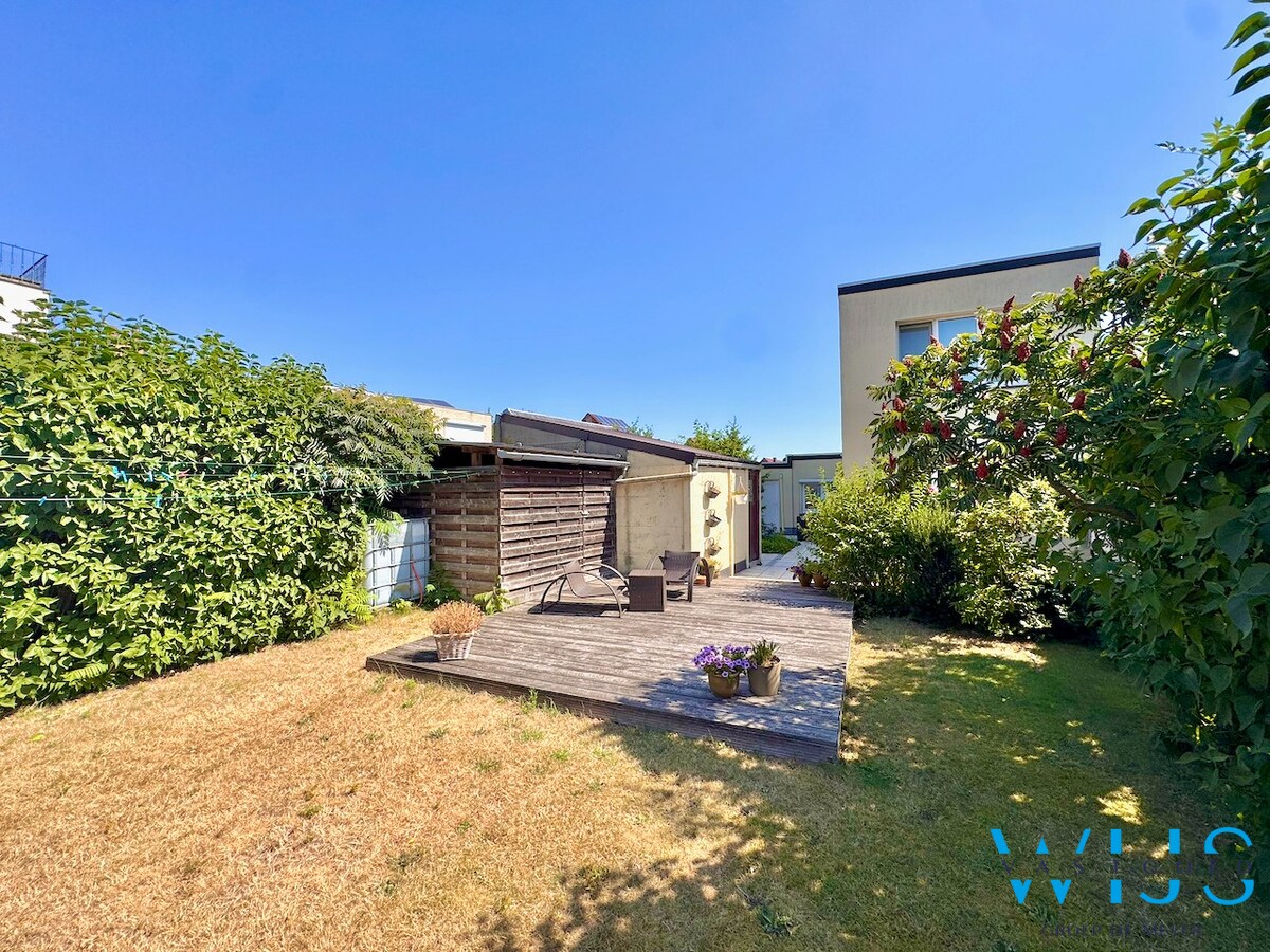 Praktisch en rustig gelegen woning met garage &amp; toffe tuin te Zelzate! 