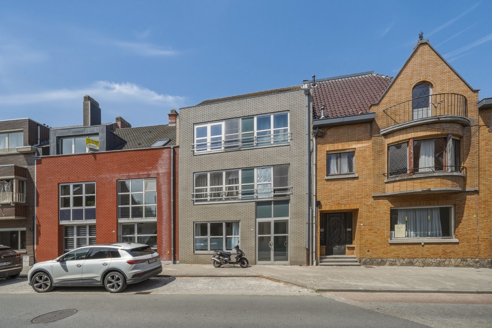Verhuurd appartementsgebouw met 3 woonentiteiten 
