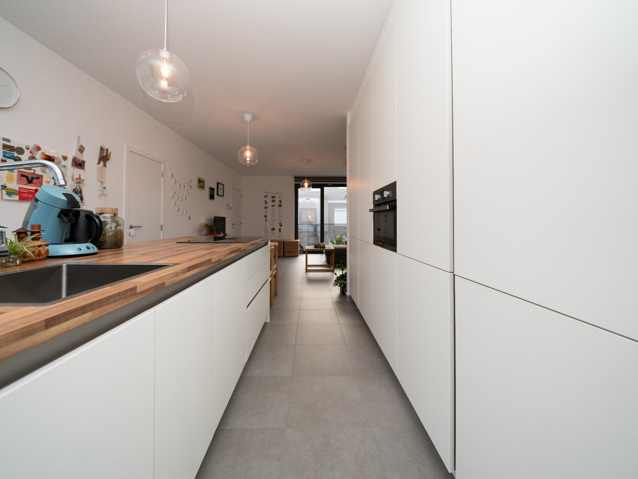 Nieuwbouwappartement met 3 terrassen, staanplaats en kelder 