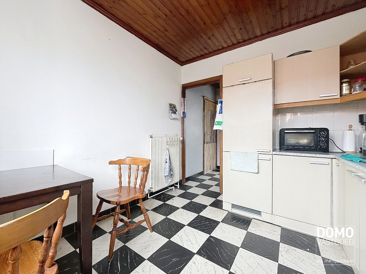 WONING MET TWEE SLAAPKAMERS, INPANDIGE GARAGE OP EEN PERCEEL VAN 5A35CA IN SINT-TRUIDEN 