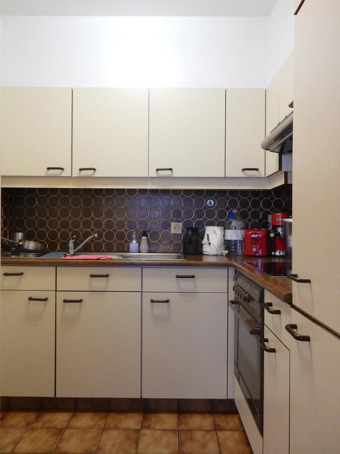 Appartement met garage en grote tuin 