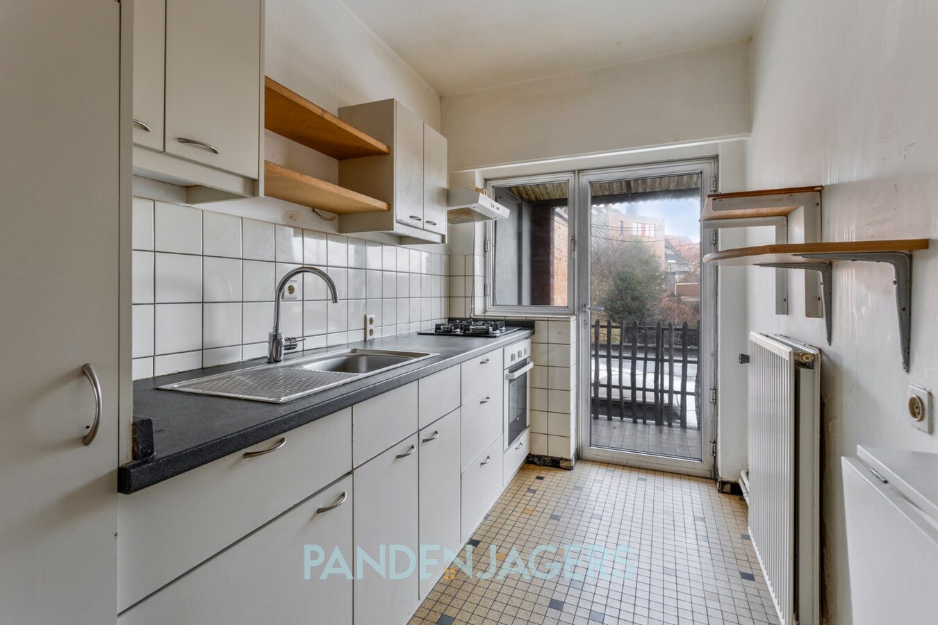 Handelshuis met winkelgedeelte en appartement te Duffel 