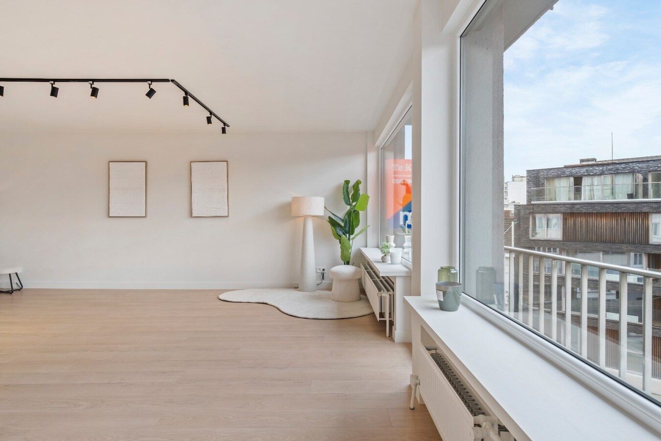 Prachtig 2-slaapkamer appartement (100m2)  met terras en garage te Kortrijk ! 