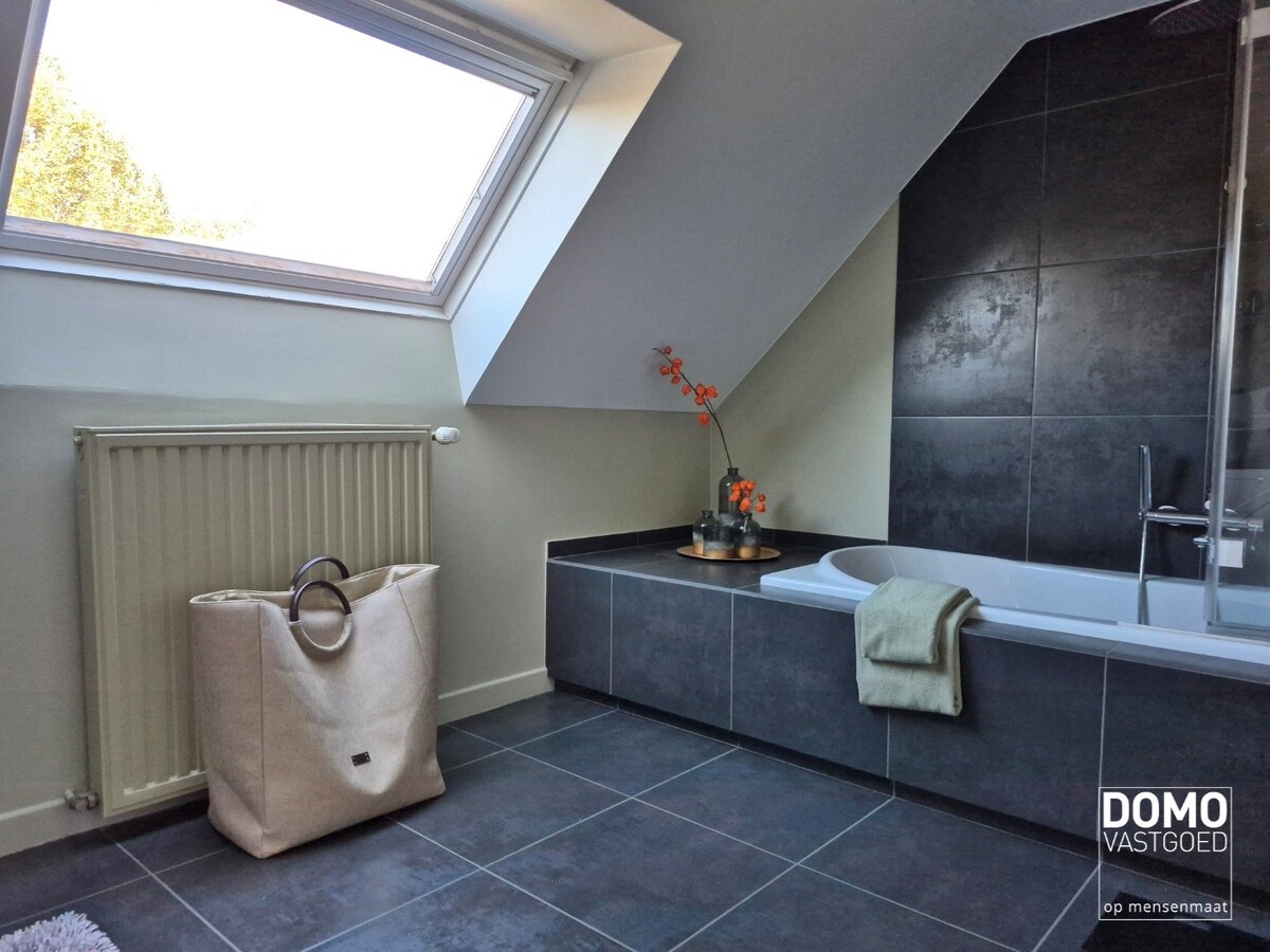 Warme gezinswoning met prachtige tuin in hartje Kortessem 