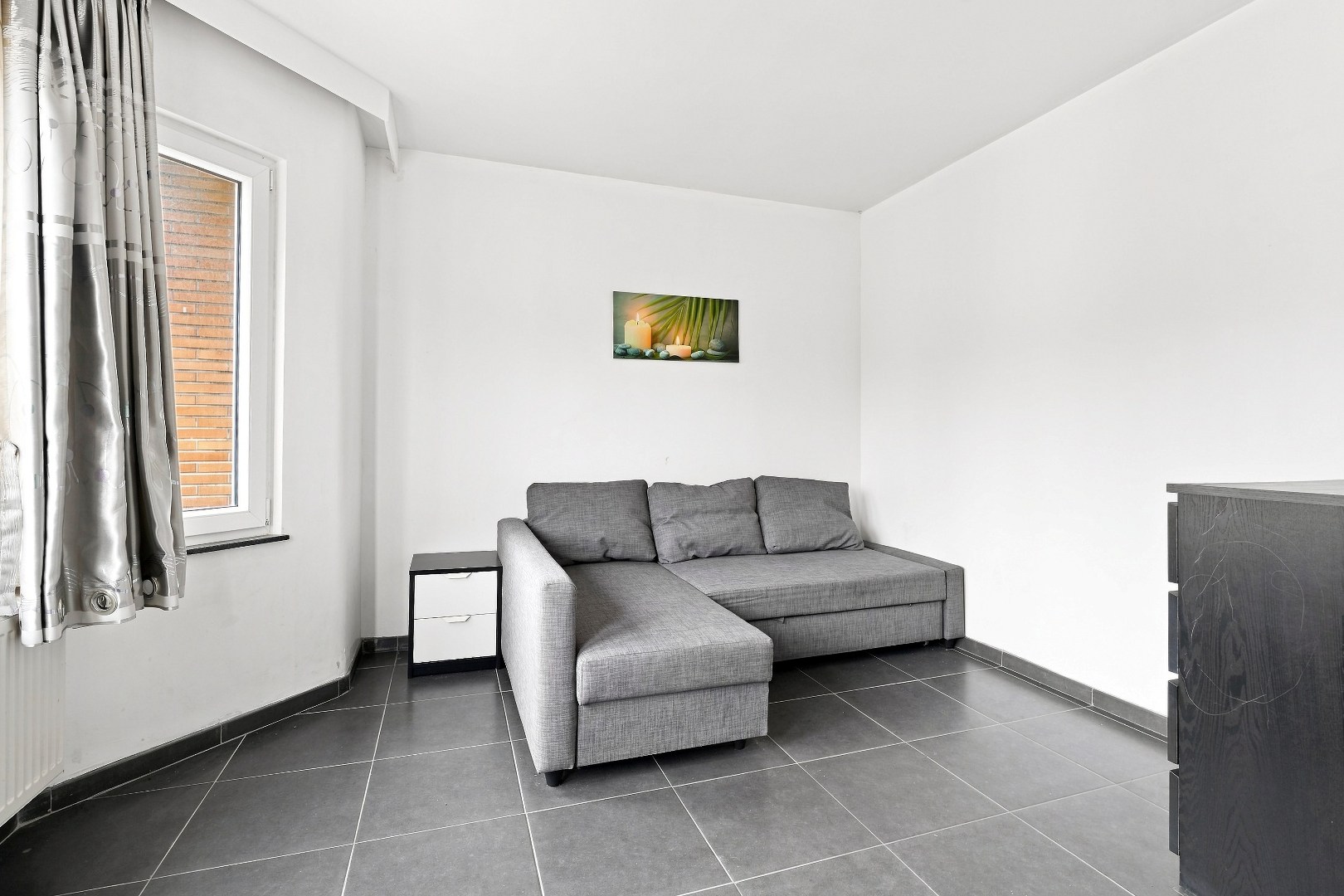 Ruime hoekwoning met 3 woonunits in het centrum van De Panne. 