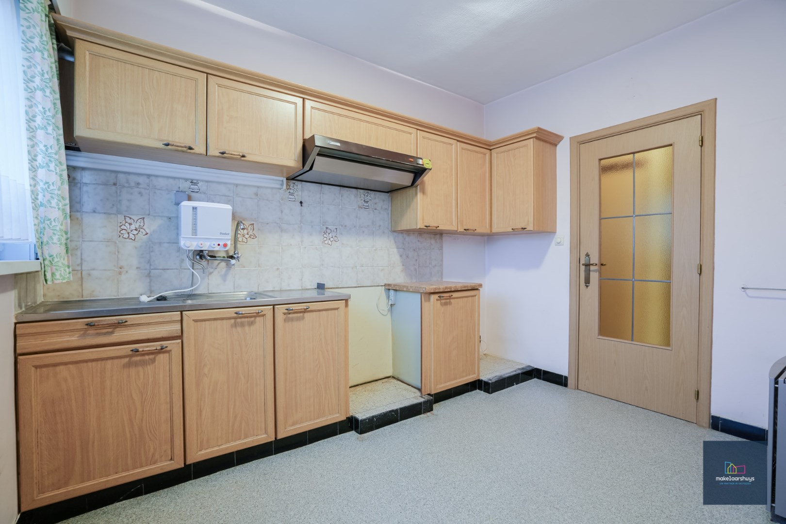 2 slpk. app met garage nabij centrum Wondelgem 