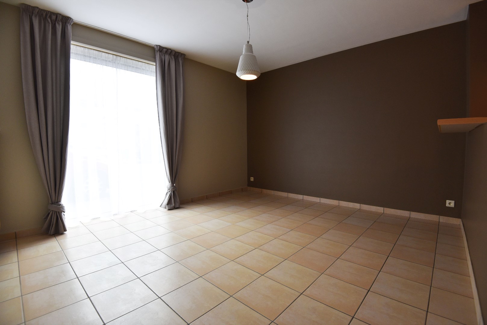 Gelijkvloers appartement met tuin en garage te Kaprijke 