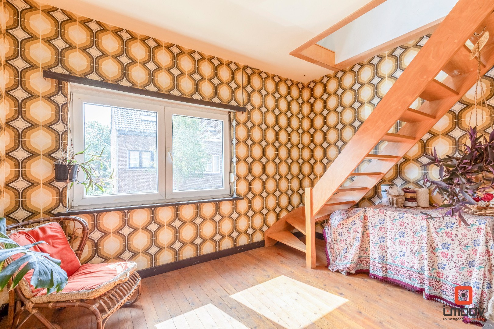 Karaktervolle tuinwijkwoning met unieke architectuur en garage te Gentbrugge 