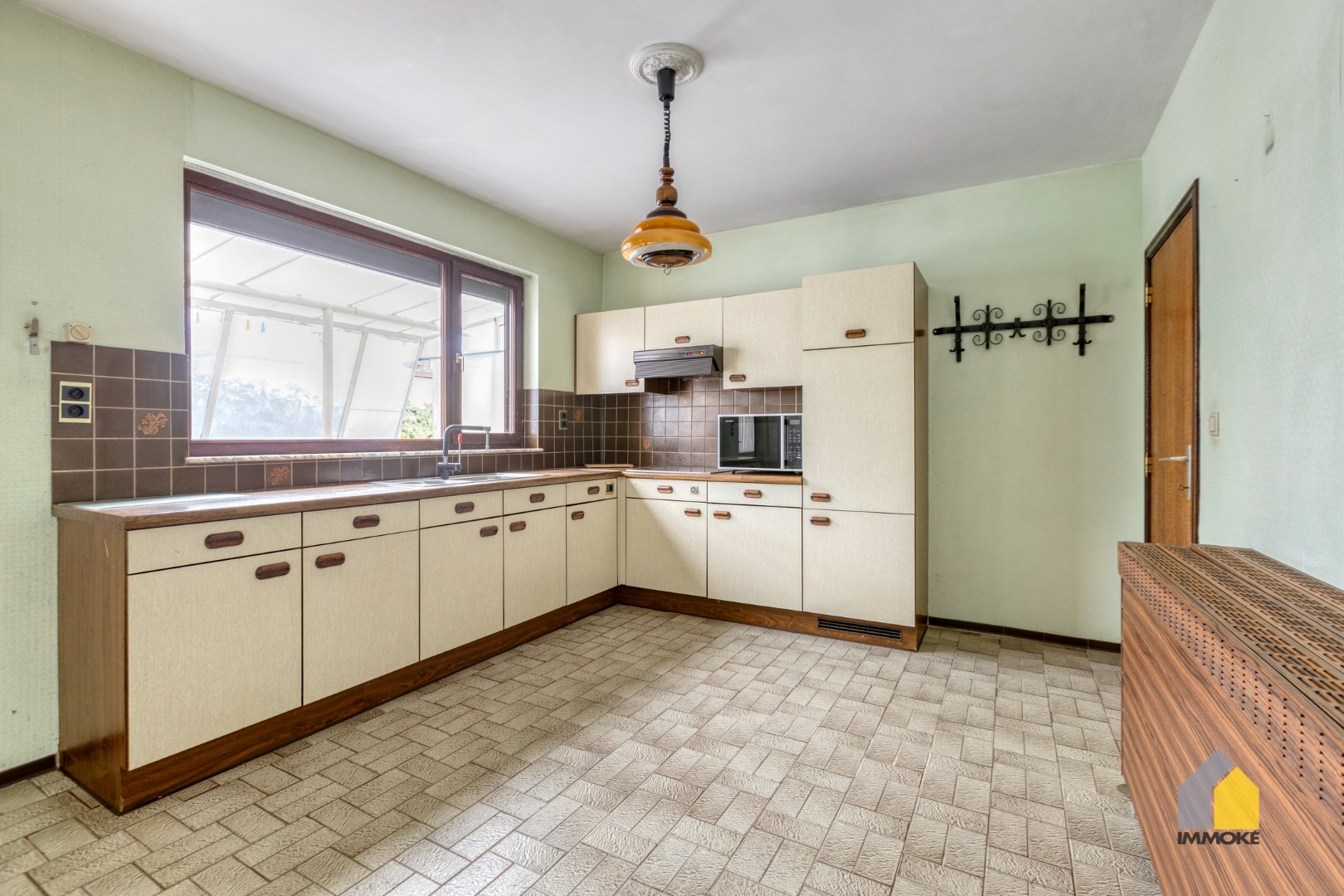 Op te frissen woning met 3 slpk op perceel van 5a 67ca. 