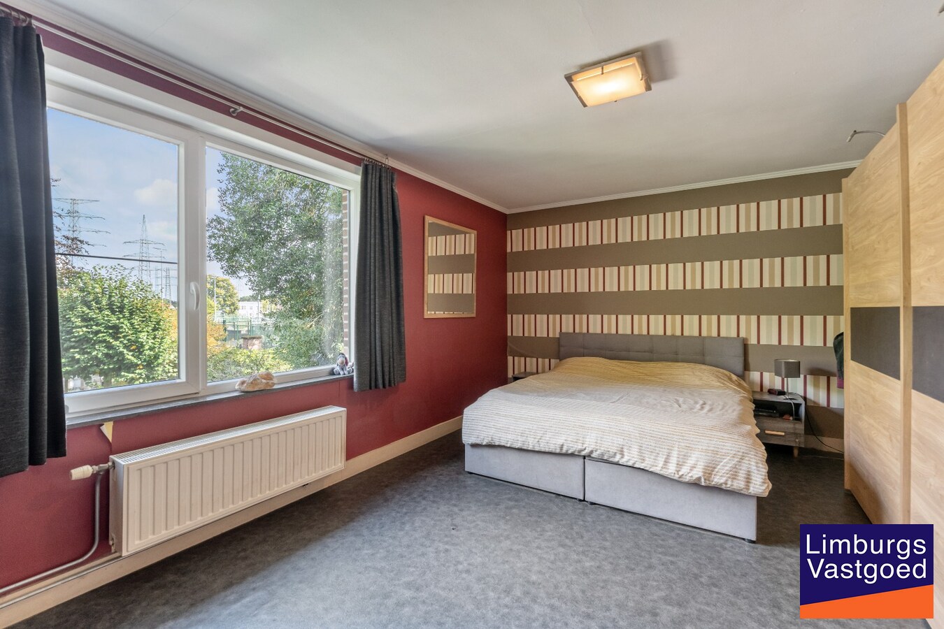 Centraal gelegen woning, 4 slpk, 180 m² bewoonbare oppervlakte, 9a 99ca 