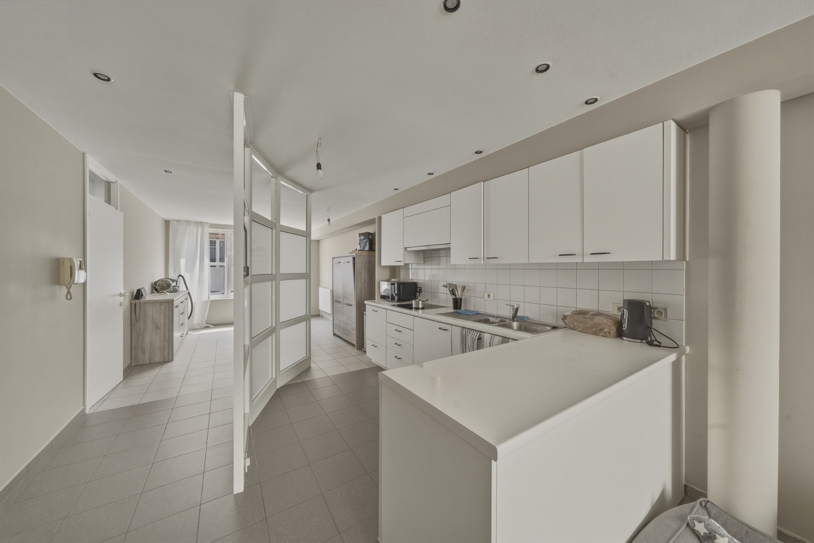 Verhuurd appartementsgebouw met 3 woonentiteiten 