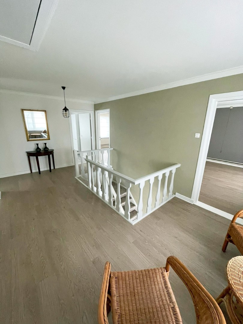 Vrijstaande, energiezuinige woning met 4 slpk en garage op een perceel van 25 a. 