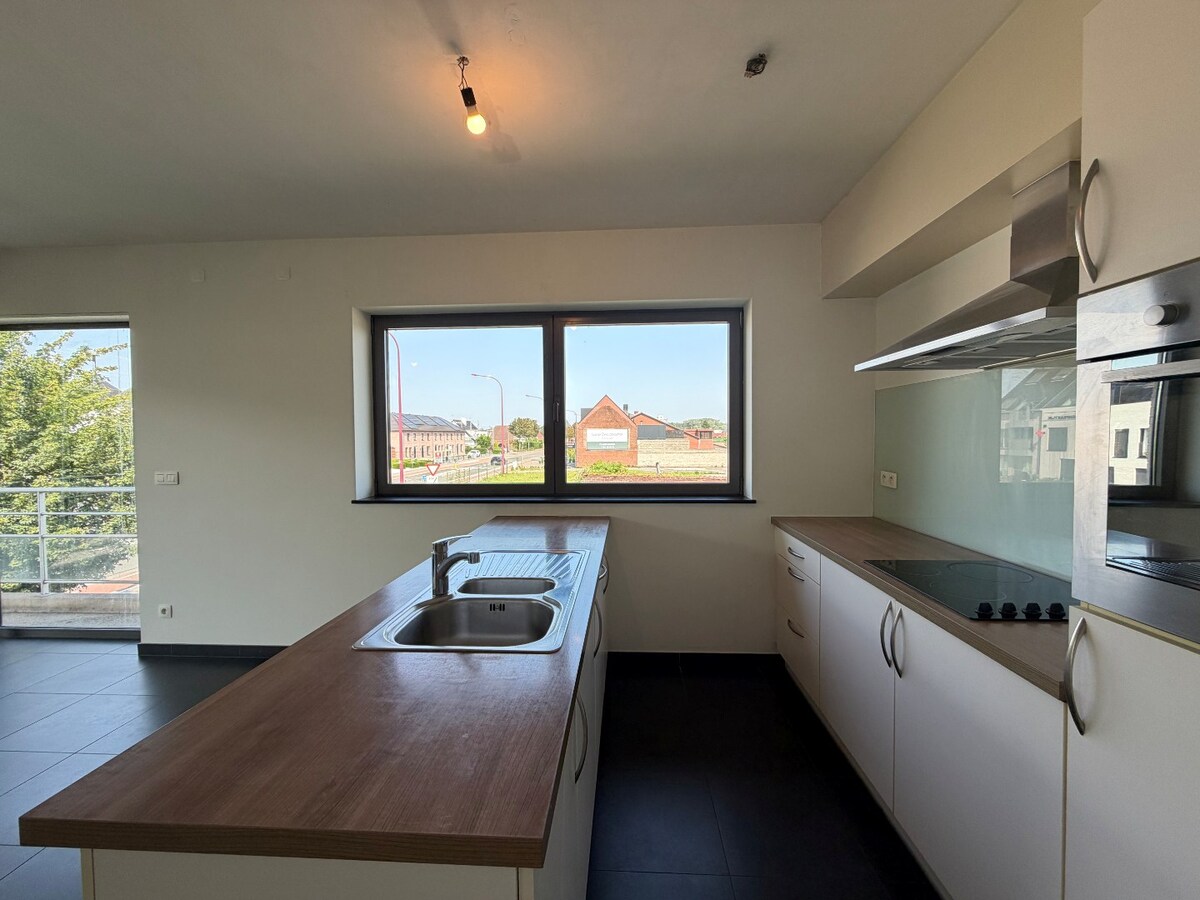 2 slpk-appartement nabij allerhande voorzieningen. 