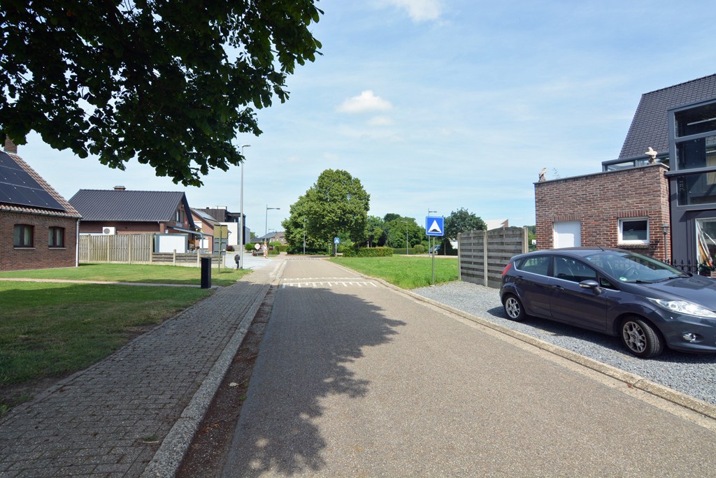 Gelijkvloers appartement met 3 slpks, veranda, tuin en garage 