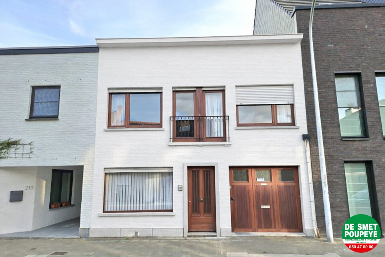 Ruime rijwoning met garage en tuin 