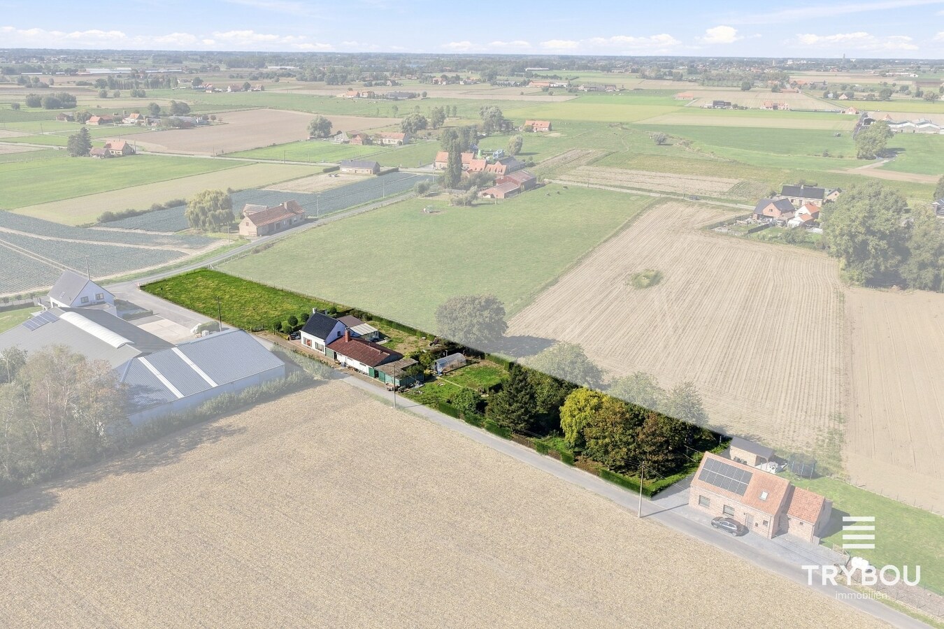 Landelijk gelegen woning met opslagplaats op 3687m² in Merkem! 