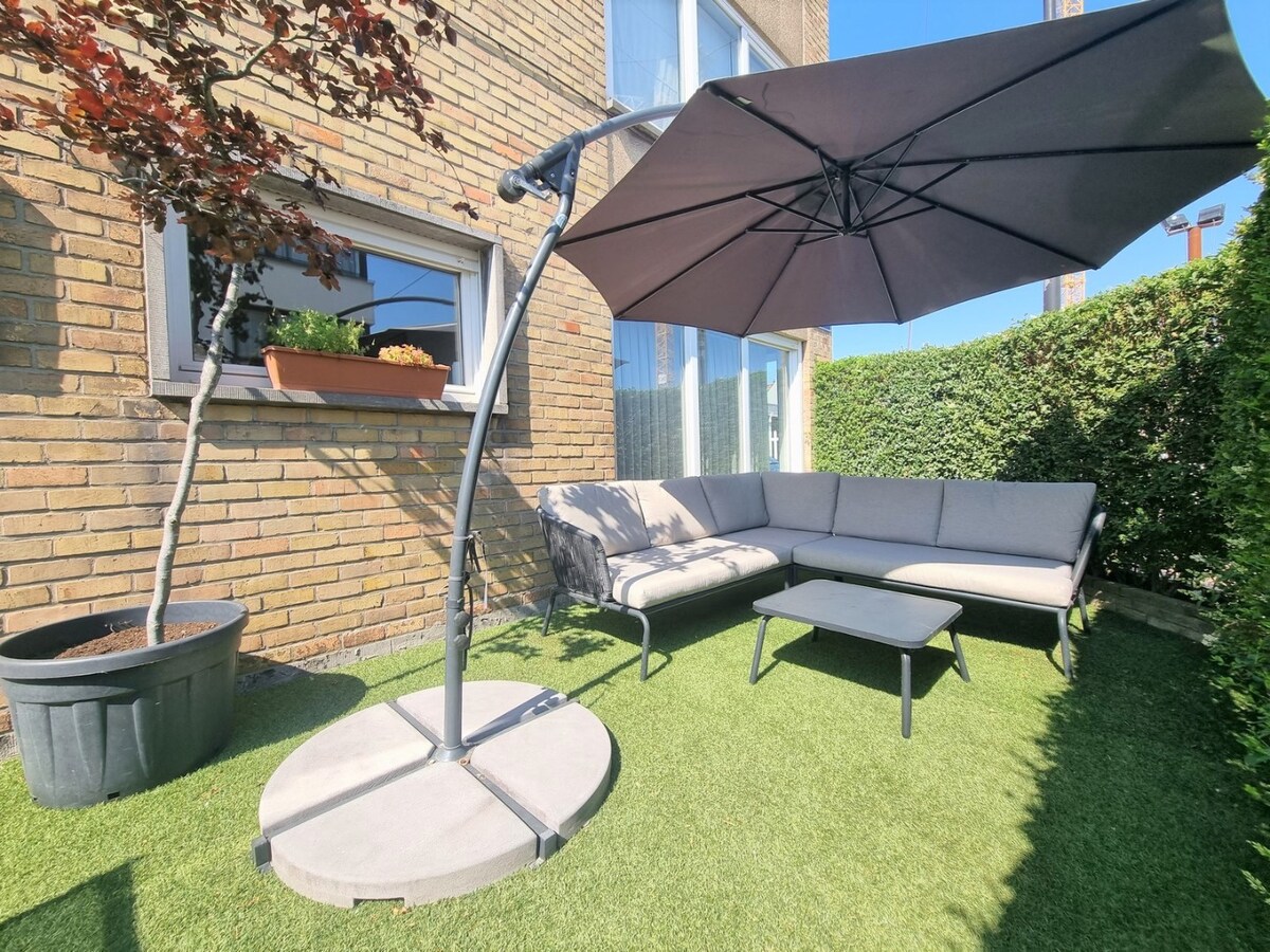 Hoekappartement met tuin en garage - Heist 