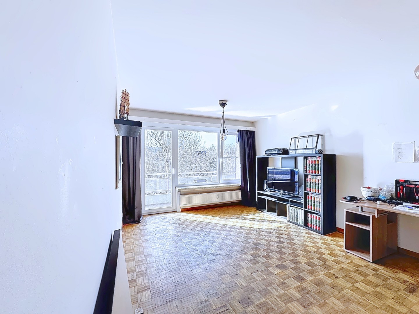 Appartement met slaaphoek en zonnig terras gelegen aan de Coupure 