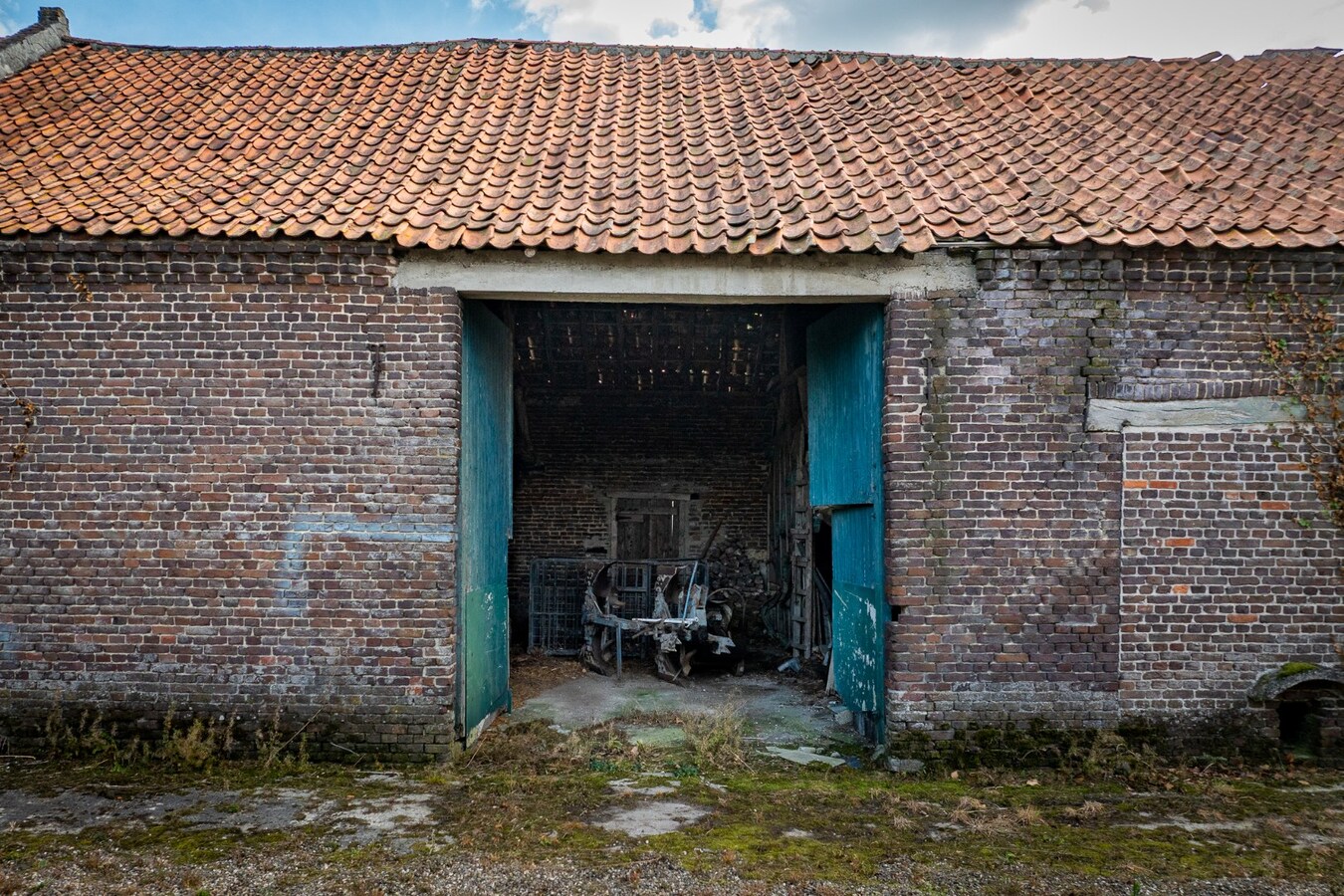 Hoeve met stalgebouwen op ca. 1ha te Bree 