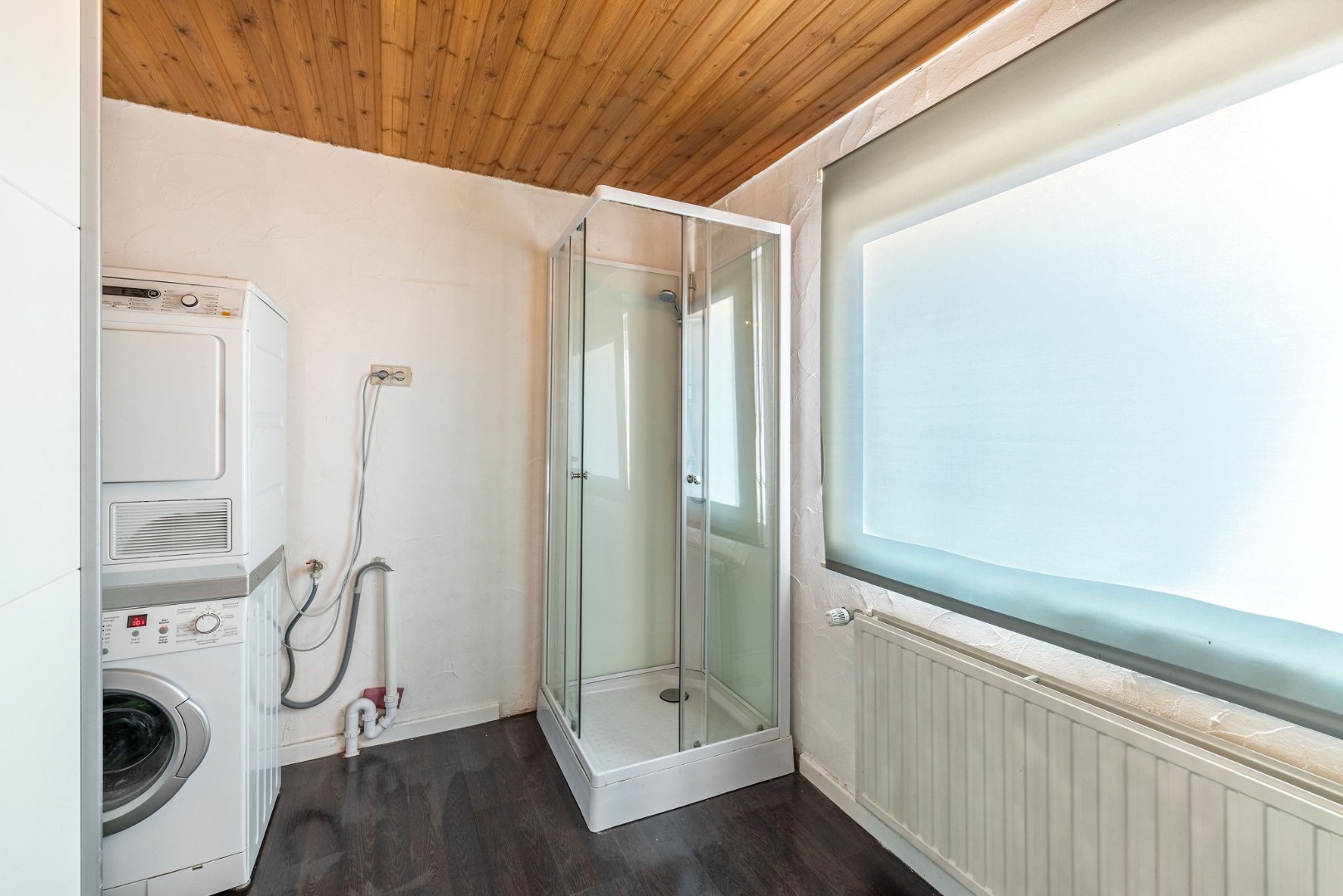 Authentieke woning met zonnige tuin, garage en bouwgrond 