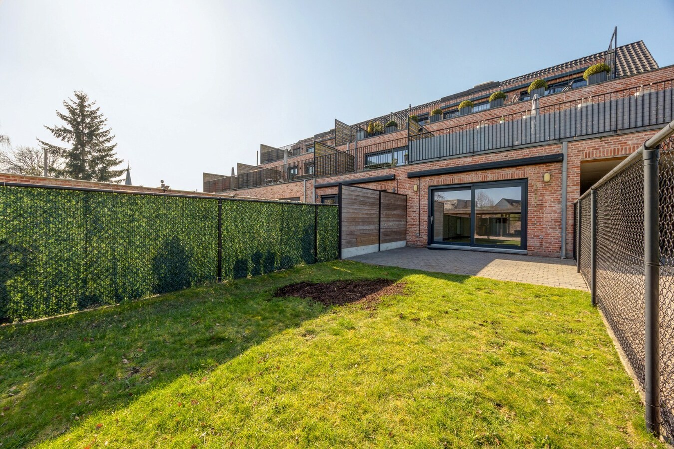 Energiezuinig gelijkvloers appartement met carport in het centrum van Broechem 