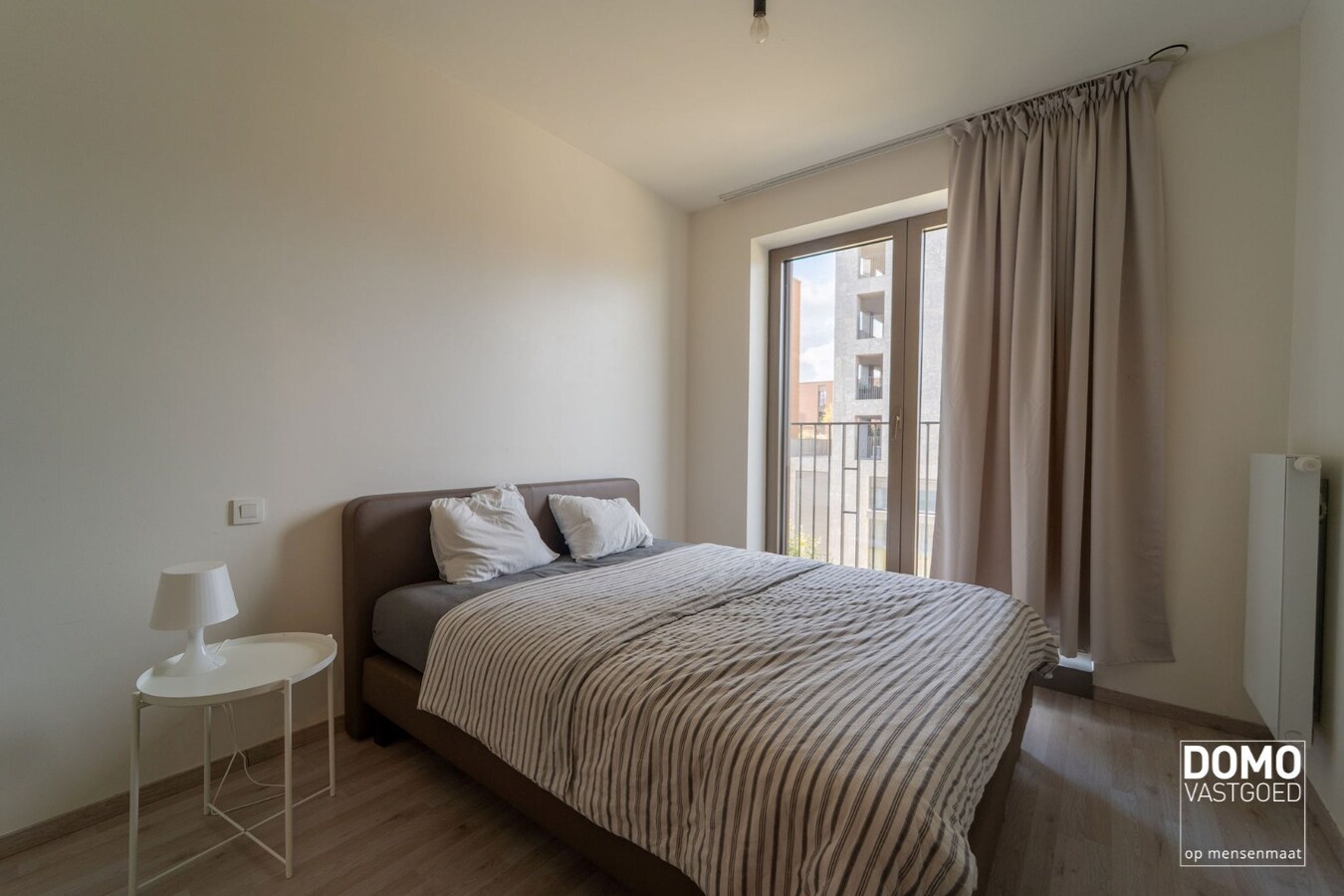 APPARTEMENT MET PRACHTIG TERRAS, 2 SLAAPKAMERS EN AUTOSTANDPLAATS TE KOOP AAN QUARTIER BLUE, HASSELT 