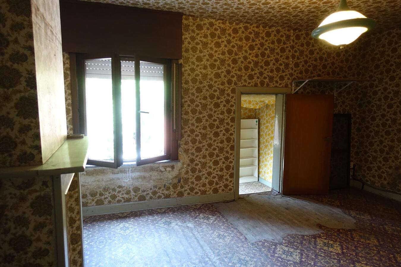 Te renoveren rijwoning op perceel van 210 m² 