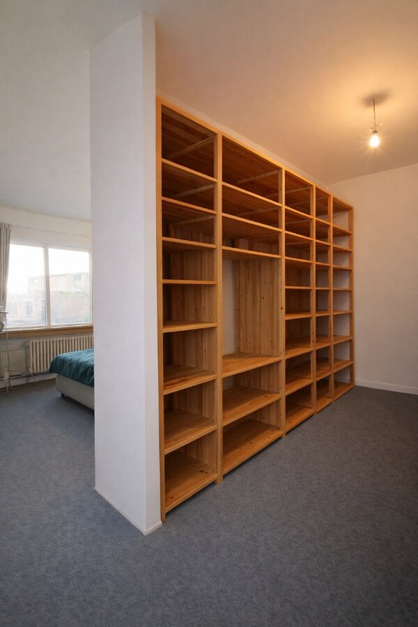 Uitzonderlijk ruim duplex appartement met extra zolderverdieping, tuin en dakterras op topligging in het centrum van Sint-Niklaas! 