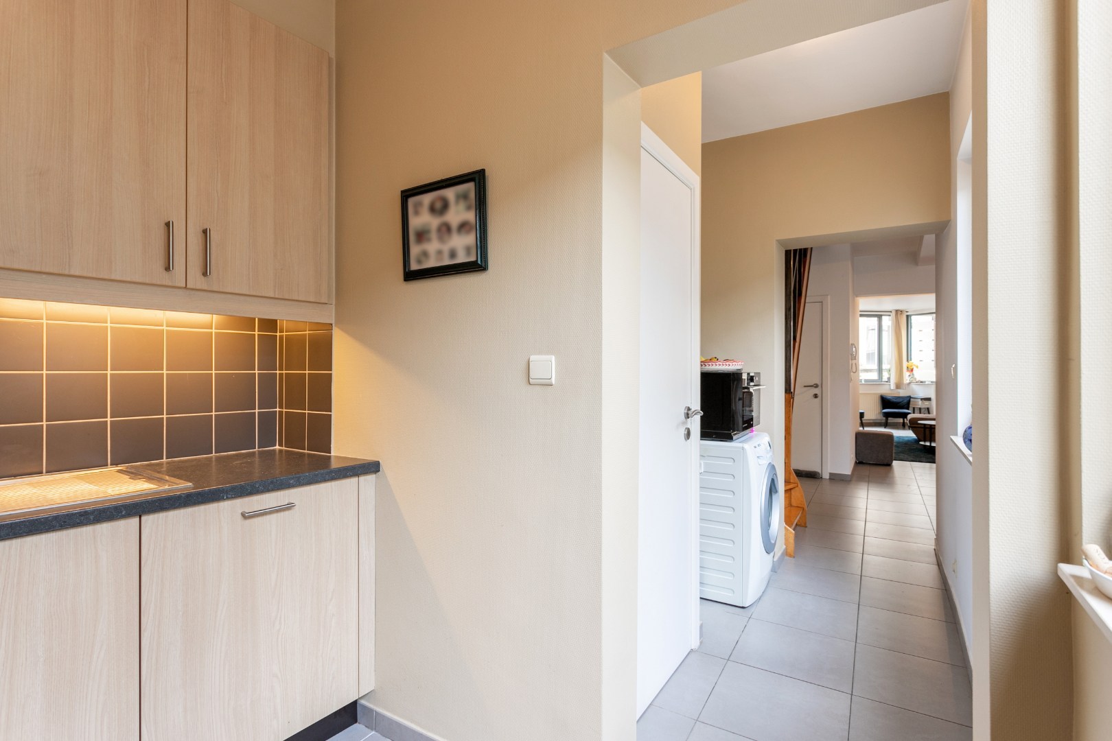 Handelspand met woonst te Halle centrum 