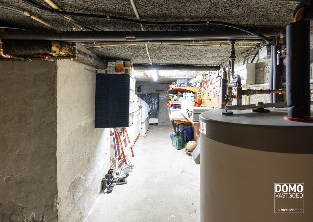 DEELS GERENOVEERDE WONING MET 3 SLAAPKAMERS, GARAGE EN RUIME TUIN TE KOOP IN KERMT 