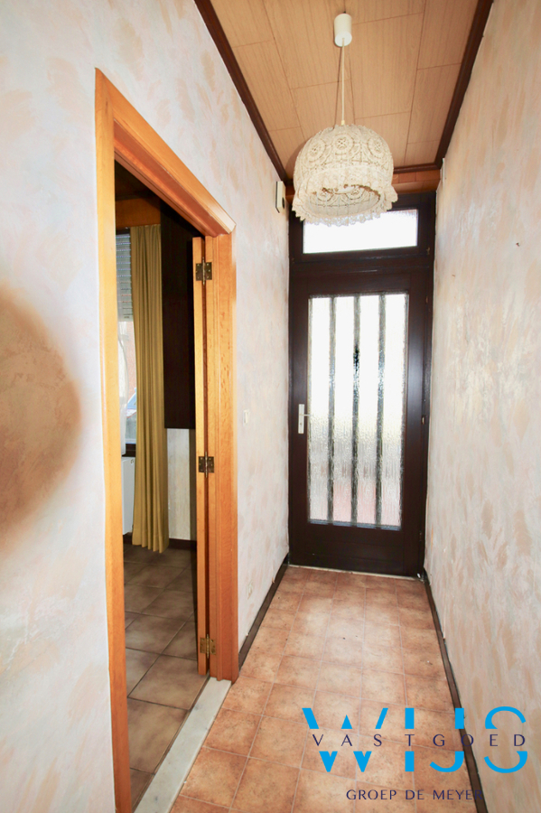 Op te frissen woonhuis op een mooi perceel te Ertvelde ! 