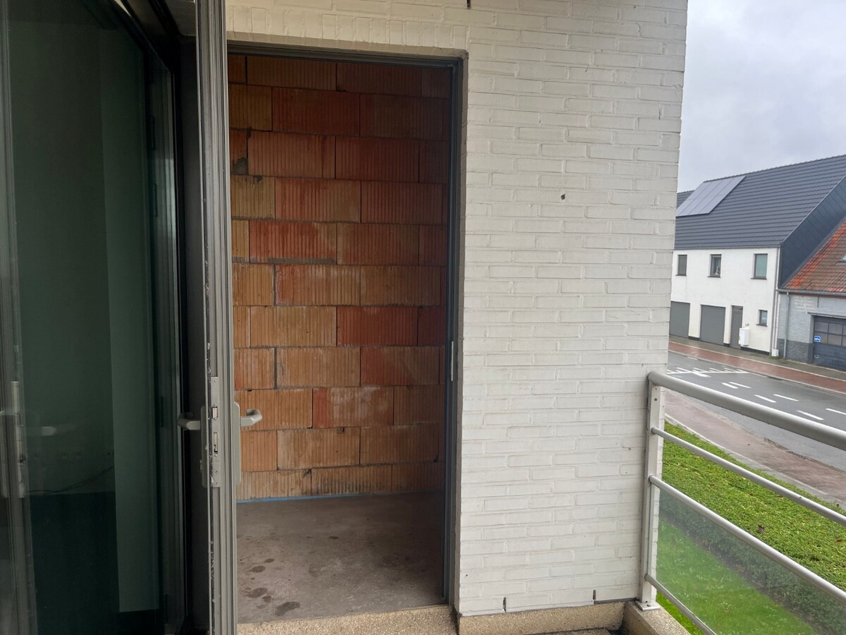 2 slpk-appartement nabij allerhande voorzieningen. 