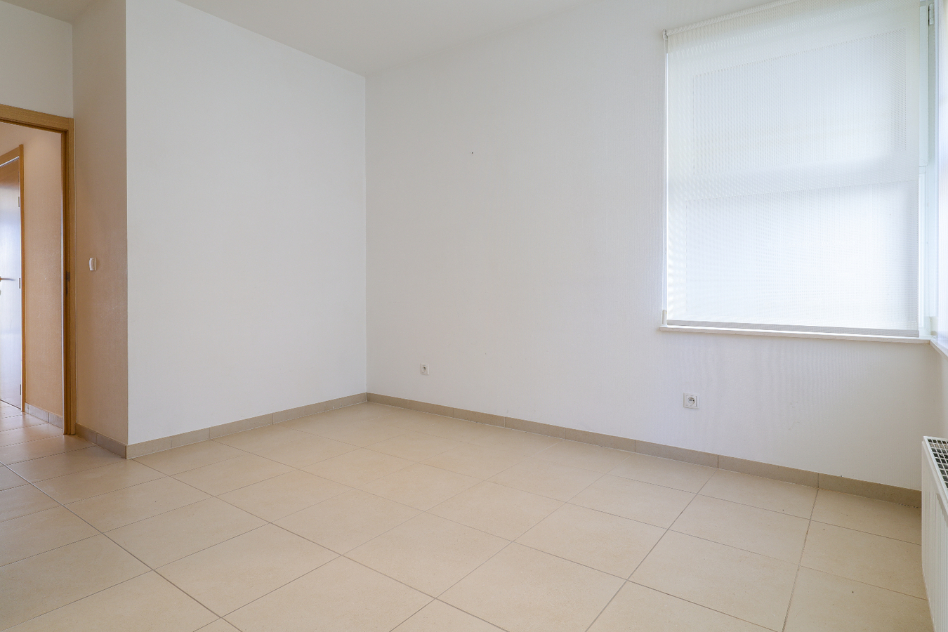 Gelijkvloers appartement met garagebox op uitstekende ligging 