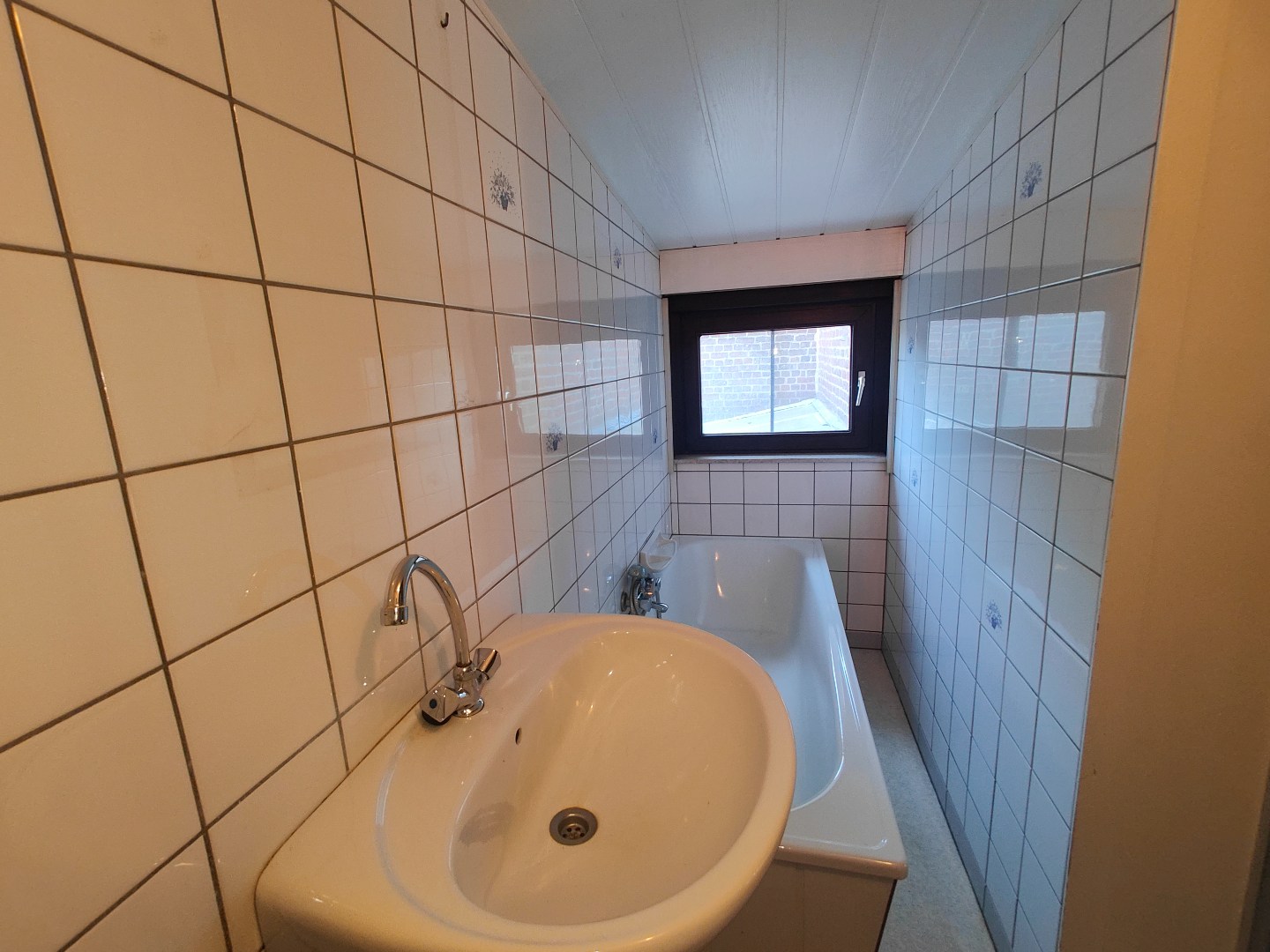 Unieke woning met achterliggende tuin  in het centrum van Pittem 