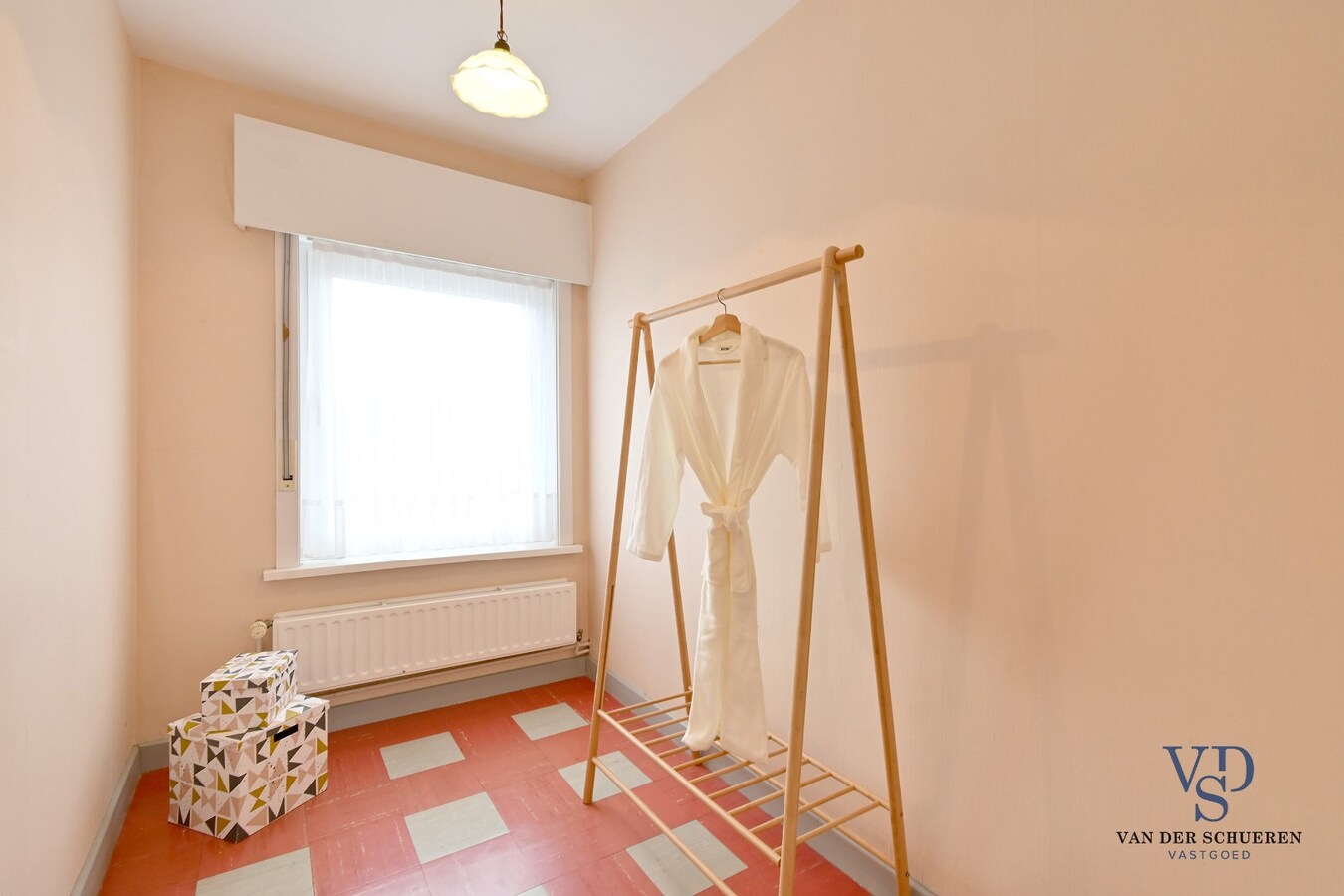 Half Open gezinswoning met potentieel 